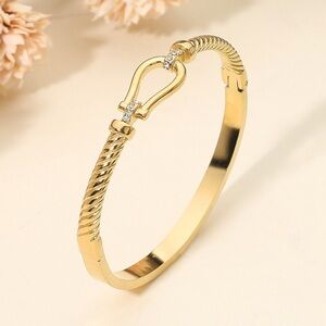Horsebit Buckle Accent Twisted Hinged Bangle Bracelet